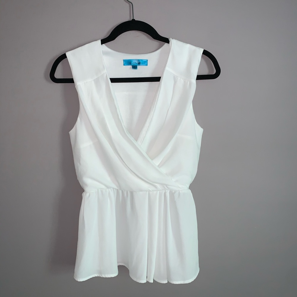 Boutique Pleated Peplum Top